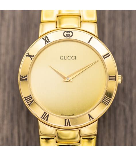 gucci black and gold watch|all gold Gucci watch.